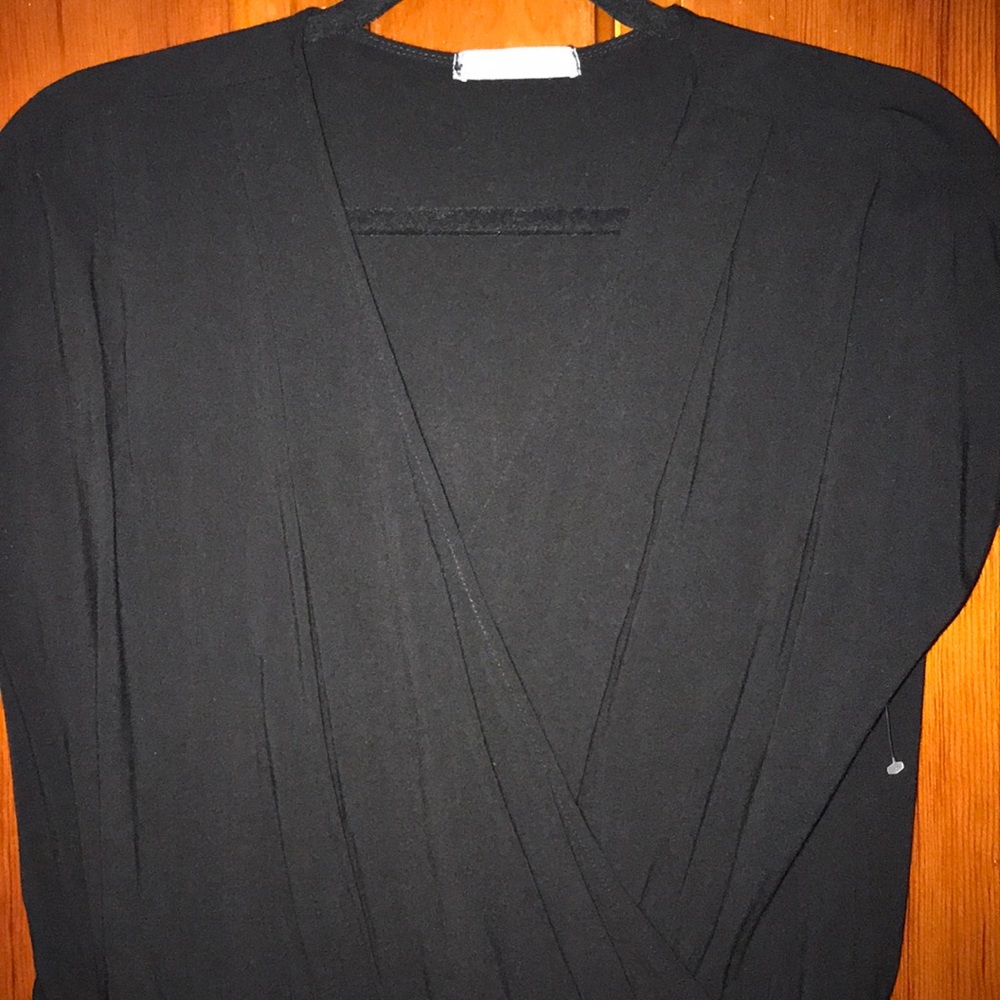NWT Jumpsuit with zippers at the ankle.